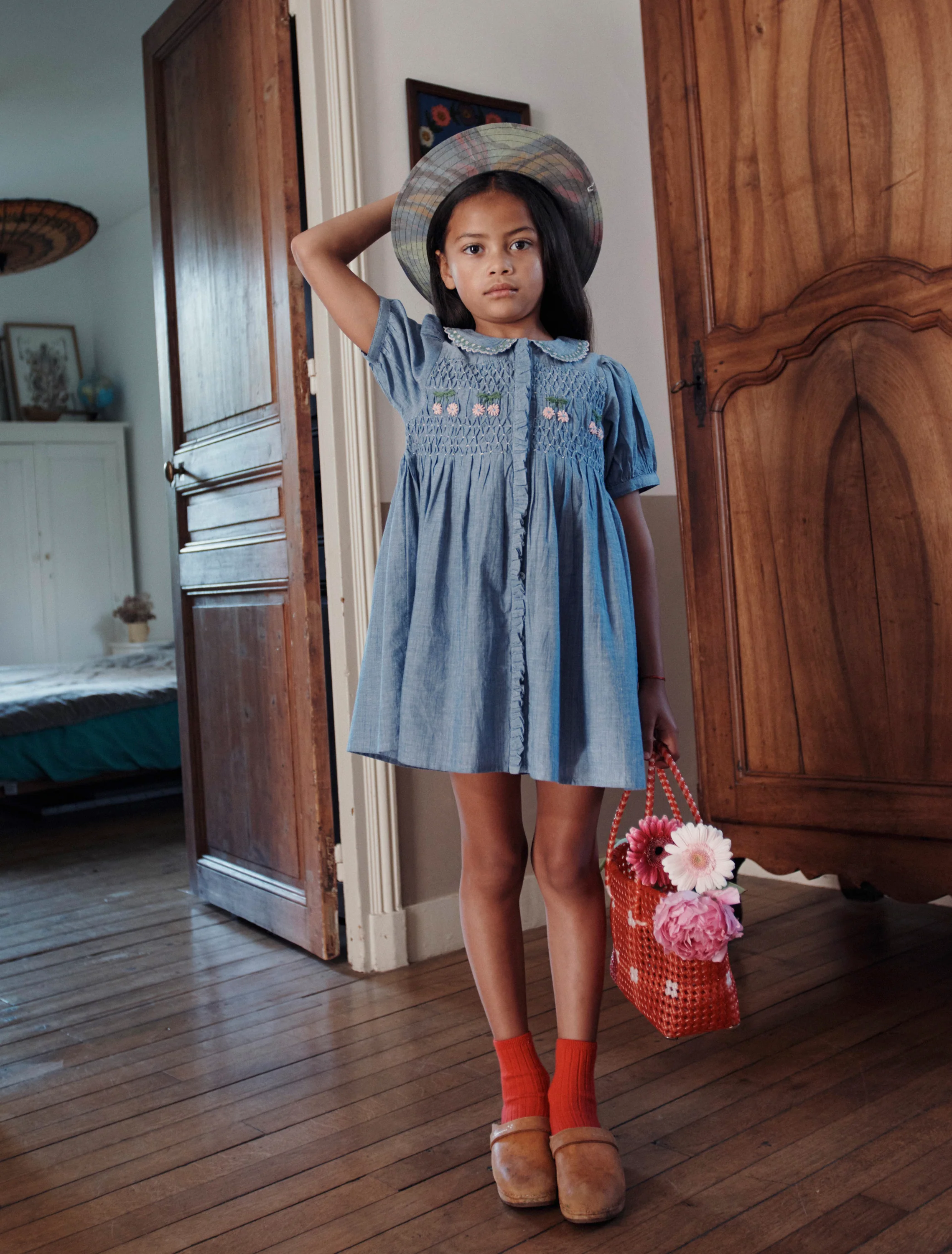 Hand-Embroidered Smocked Dress in Chambray - Image 3